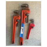 Three pipe wrenches