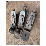 Two craftsmen and one unknown wood plane