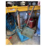 Taxidermist adjusting work stands