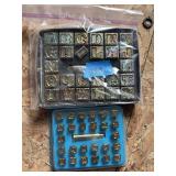 Two sets of decorative leather lettering stamps