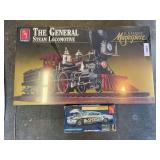 AMT by Ertl the general steam locomotive model new in package and 1953 Studebaker custom kit