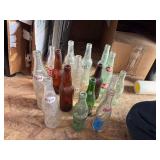 Large group of assorted pop bottles and a Blatts beer bottle
