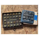 Two sets of leather stamps