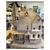 Large dollhouse in the process of being constructed - extra parts included!