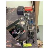 9 assorted fishing reels
