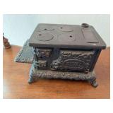 Rival cast iron mini cookstove, 8" wide x 4.75" tall