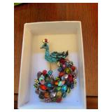 Bejeweled peacock pin