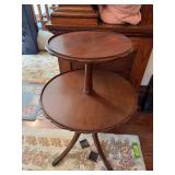 Pie crust edge 2 tier table w/Duncan Phyfe legs Chip on lower shelf has been repaired