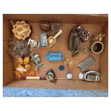 Box full of miniature items as shown