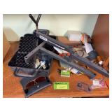 Gun rest, shell box, choke tubes, pistol case, and more