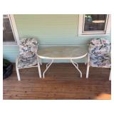 32x52 glass topped patio table and two chairs w cushions