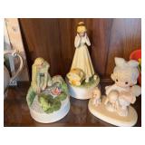 Two Mann music boxes and a Precious Moments figurine
