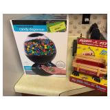 Motion activated candy dispenser and Radio Flyer “My Little Trav-Ler Wagon”