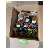 Assorted artificial succulent plants in planters