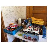 Modern day kids toys includes tractors, cars, barnyard, animals, etc