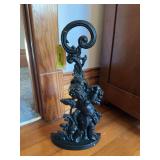 Modern cast iron cherub door stop