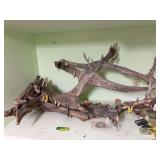44" driftwood w/ plethora of fishing lures. Great display piece