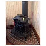 Onward #3 wood room stove, 23" wide x 25" tall , comes with brick half round "hearth" and chimney pipe