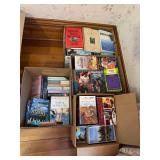 Four boxes of paperbacks, lots of romance