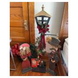 Lighted wooden cut out lamp post with carolers and Christmas wreath