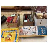 Misc items include playing cards, tablecloth cards, holiday paper items, coin holders, Garfield activity book, etc