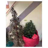 2 small artifical Christmas trees, one lighted