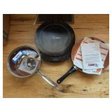 Nuwave 2 induction cooktop and two pans