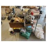 Light duty metal shelving unit with random miscellaneous shop and garage items