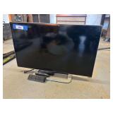 Small Vizio flatscreen TV - works and was used in the garage