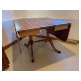 Duncan Phyfe leg double drop leaf dining room table with additional 12 inch leaf 38x38 with two 16” drop downs