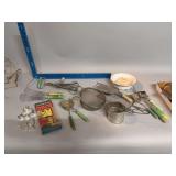 Box of vintage kitchen utensils, many green handles