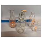 Milk bottles, some local and a cream spoon