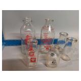 Various brand and size milk bottles