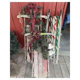 3 decorated sleds