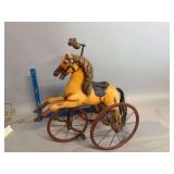 Vintage horse velocipede with cast iron stirrups etc and horse hair tail?