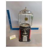 Penny candy dispenser w/ key 18” tall approx. has money in it 😳