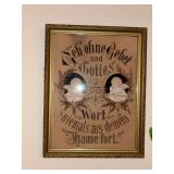 Framed German verse Appears handmade