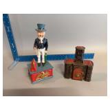Two cast iron banks-Uncle Sam and Tower Bank 1890