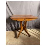 22x29x20H parlor table on porcelain wheels