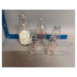 Milk bottles, some local