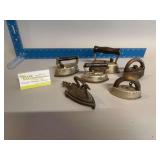 Mini sad irons, rests and handles Check out the swan!!