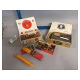 Two cigar boxes- one w dominoes and the other w stamps