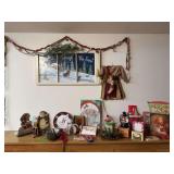 Christmas decor includes painted window, candle, Santas, picture frames,  etc