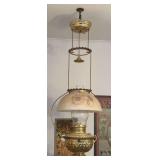 Hanging oil lamp with brass font, hand painted shade, two matching rings, smoke bell and reel