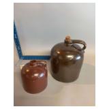 Minnesota Stoneware Co beehive style jug 1/2 gallon and an unmarked larger maybe a 1???