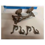 Cast iron lamp bracket for two lamps and 4 coat hooks