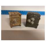 Two cast iron safe banks Bottom of black one is marked Arrow Specialties Los Angeles, CA