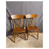 Two matching spindle back dining chairs
