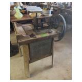 Unmarked washing machine, wood and galvanized base