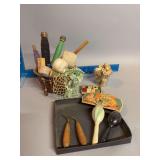 Basket of sewing notions includes thread, spools, darners, needle book